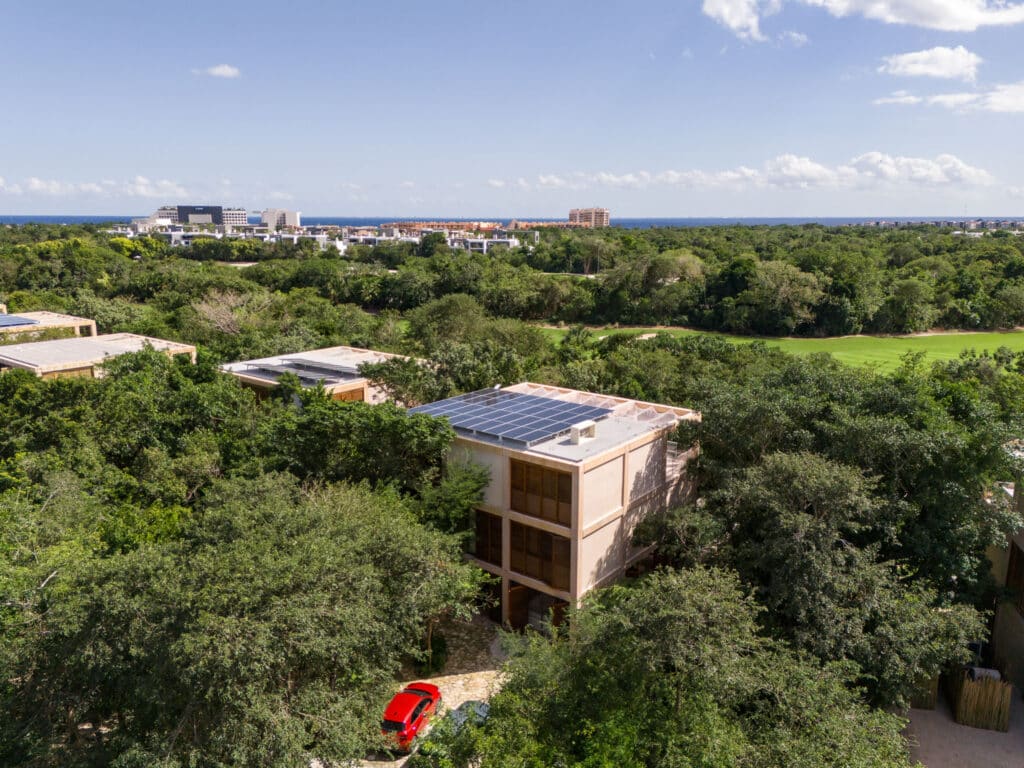 drone photo of palm villas house showing rooftop with solar panels